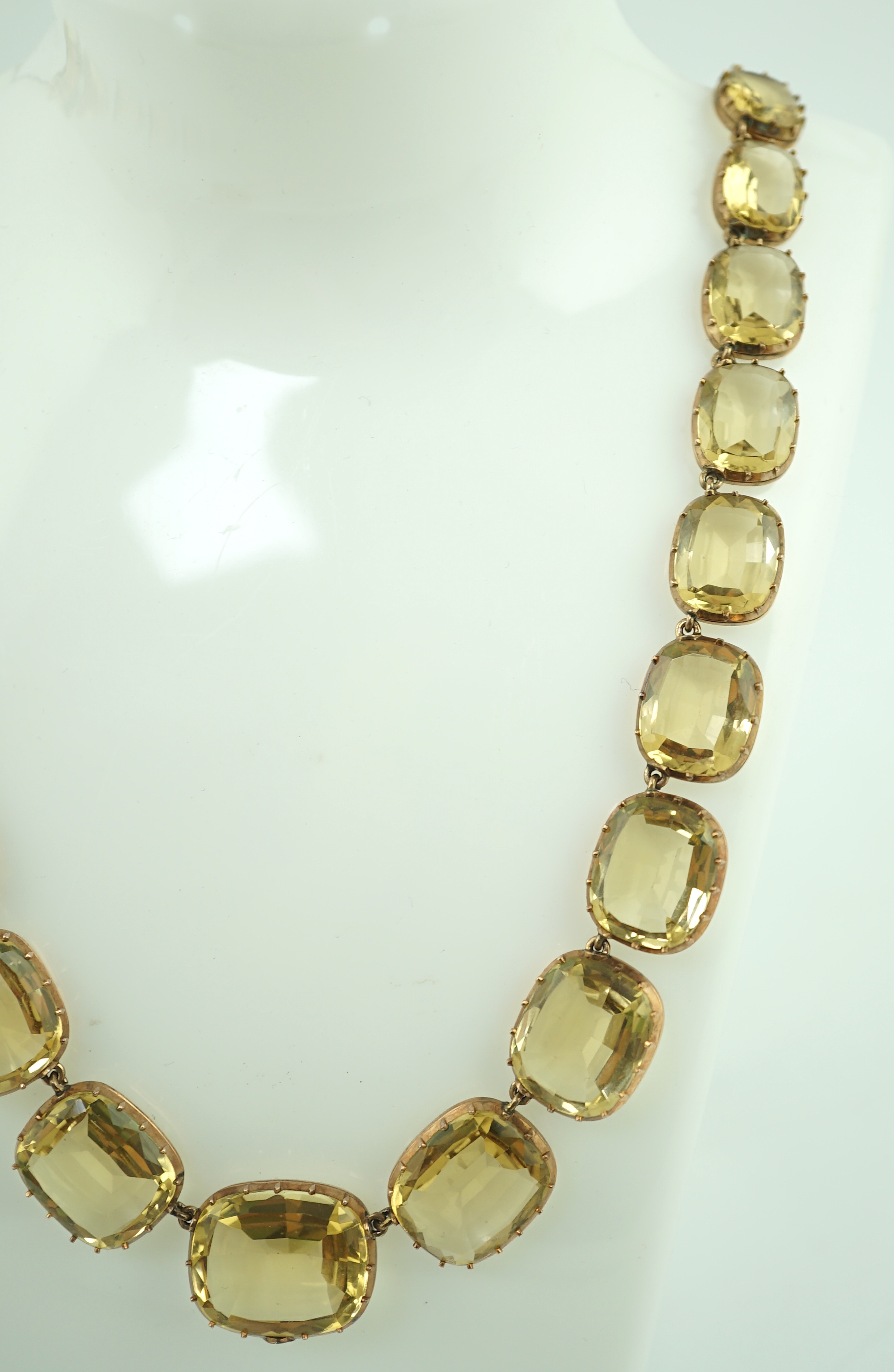 A Victorian gold and graduated cushion cut citrine necklace